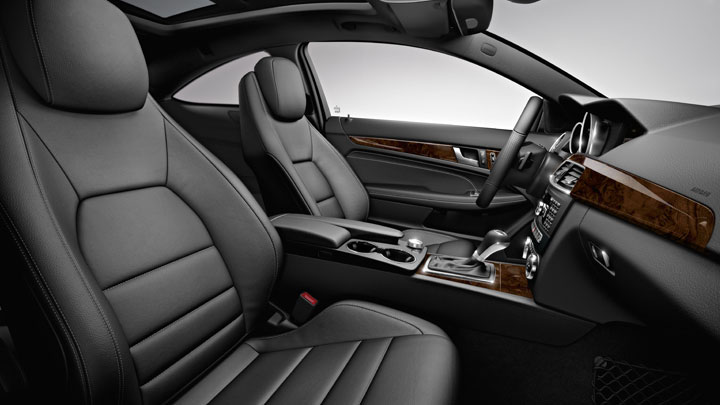 Leather upholstery on all seating surfaces