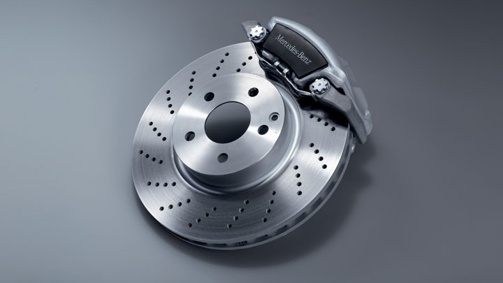 Perforated front brake discs with painted calipers
