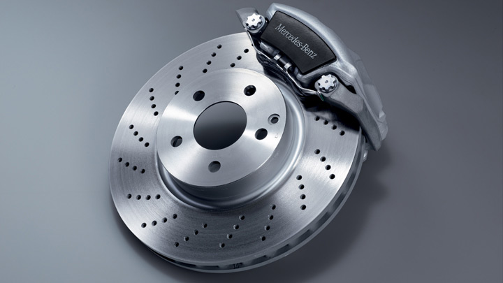 Perforated front brake discs with painted calipers