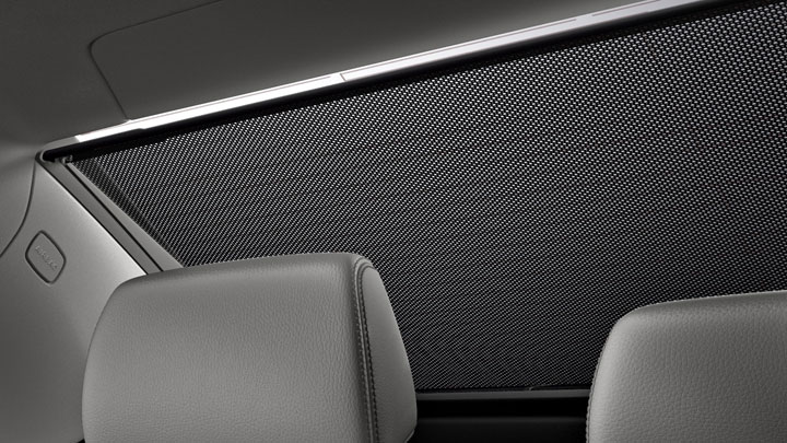 Power rear-window sunshade