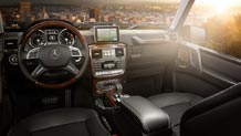 in Black Premium leather with Burl Walnut wood trim