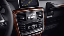 in Black Premium leather with Burl Walnut wood trim
