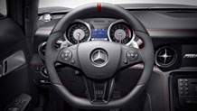 in Black designo Exclusive leather with red stitching