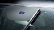 Rain-sensing windshield wipers