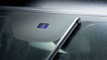 Rain-sensing windshield wipers