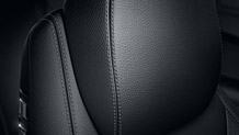 Sport seats with integrated head restraints