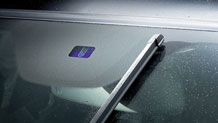 Rain-sensing windshield wipers