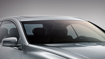Noise-reducing infrared-reflecting glass