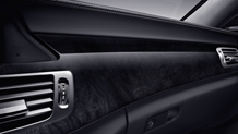 High-gloss wood trim (Burl Walnut or Black Ash)