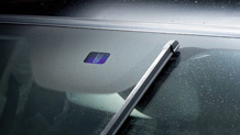 Rain-sensing windshield wipers