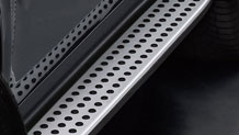 Brushed aluminum running boards with rubber studs