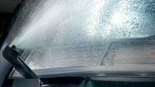 Headlamp washing system