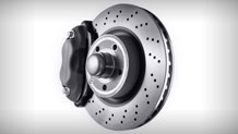 Perforated front brake discs with 4-piston calipers