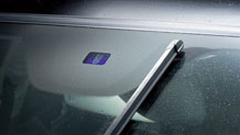 Rain sensor for windshield wipers