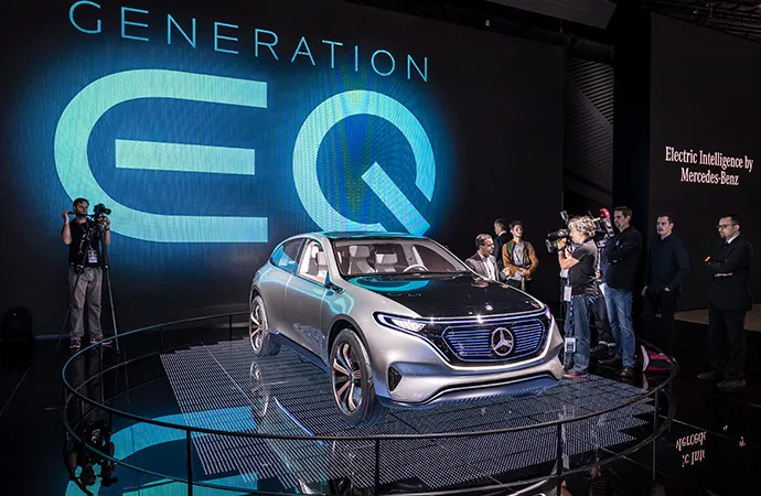 A Mercedes-Benz EQ SUV is unveiled at an auto show