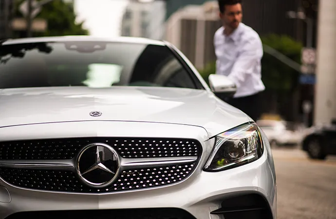 Close-up of the diamond grille on a Mercedes-Benz coupe.
