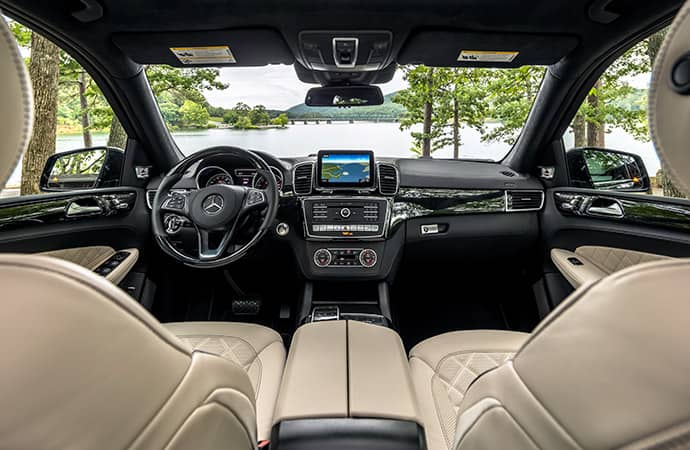 An interior shot of the wide-open cabin of a Mercedes-Benz SUV.