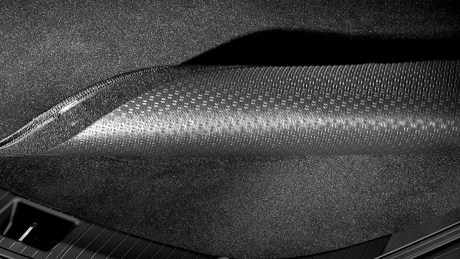 Reversible cargo mat
