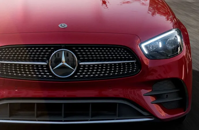 Display E 350 Sedan in designo Cardinal Red with Exterior Lighting Package