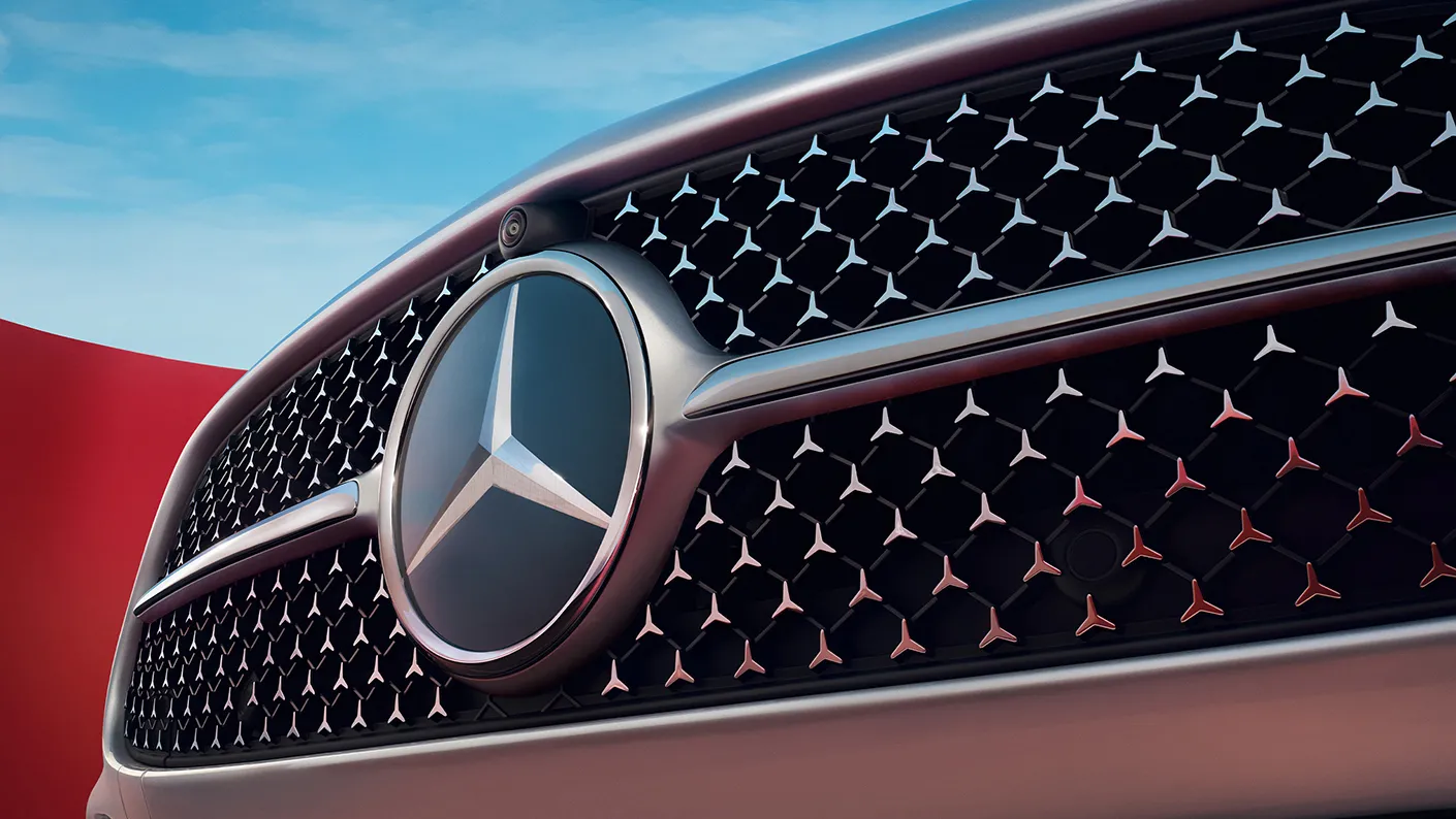 Close up of 2023 C-Class emblem on the front of the sedan
